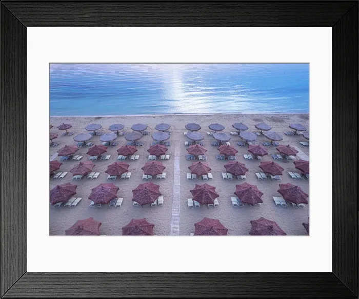 Framed Print : Aerial view of large group of tidy beach umbrellas facing the Mediterranean Sea, Italy, Europe Framed Print : Aerial view of large group of tidy beach umbrellas facing the Mediterranean Sea, Italy, Europe