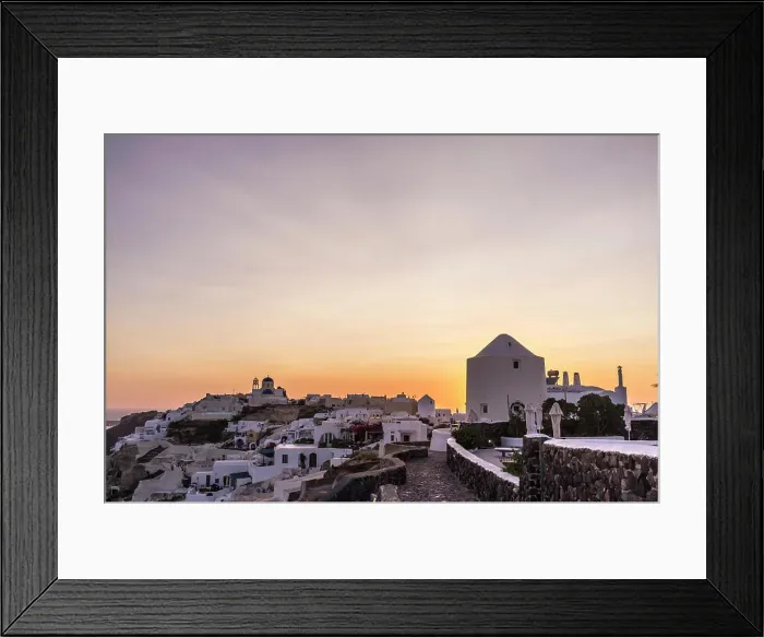 Framed Print : View of town at sunset, Oia, Santorini, Greece