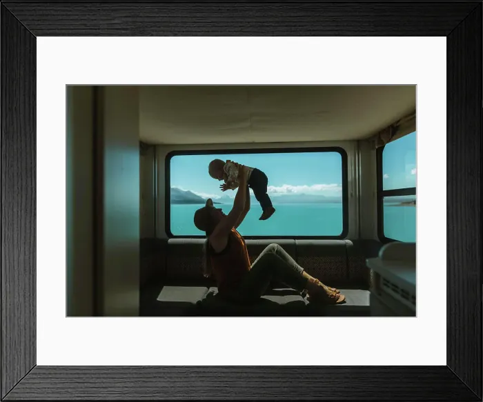 Framed Print : Mother playing with baby in motorhome, Wanaka, Taranaki, New Zealand Framed Print : Mother playing with baby in motorhome, Wanaka, Taranaki, New Zealand