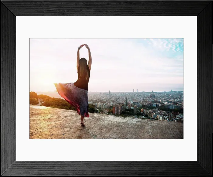 Framed Print : Spain, Barcelona, Woman ldancing at view point over city Framed Print : Spain, Barcelona, Woman ldancing at view point over city