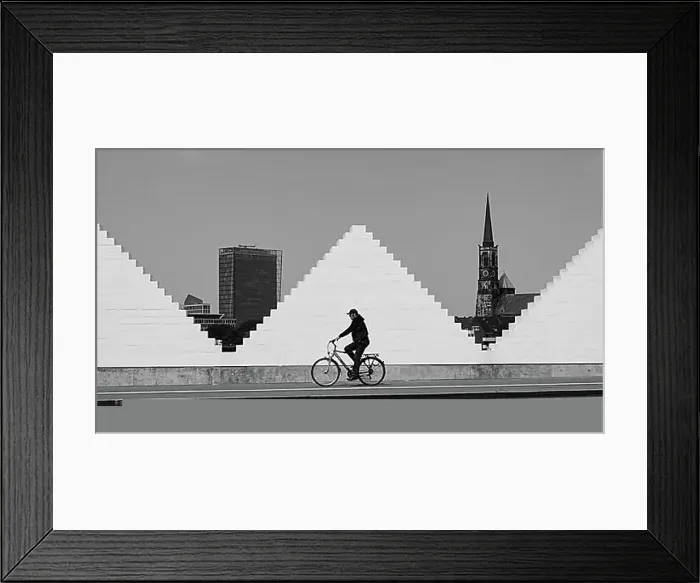 Framed Print : Cyclist in front of white wall, church and high-rise building behind, Hanseatic city, Bremen, Germany, Europe Framed Print : Cyclist in front of white wall, church and high-rise building behind, Hanseatic city, Bremen, Germany, Europe