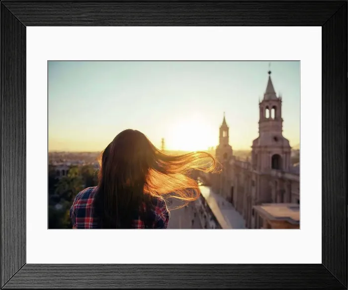 Framed Print : Peru, Arequipa, woman looking at Plaza de Armas enjoying sunset
