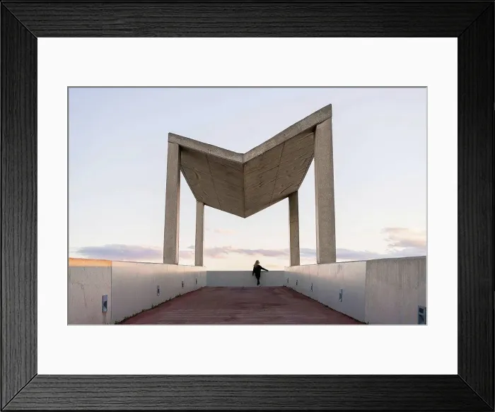 Framed Print : Spain, Barcelona, back view of young woman looking at distance
