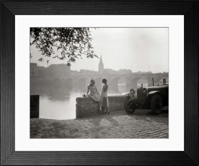 Framed Print : 1920s TWO YOUNG WOMEN WITH ANTIQUE AUTOMOBILE SITTING STANDING TOGETHER TALKING BY STONE WALL LOIRE RIVER VALLEY FRANCE Framed Print : 1920s TWO YOUNG WOMEN WITH ANTIQUE AUTOMOBILE SITTING STANDING TOGETHER TALKING BY STONE WALL LOIRE RIVER VALLEY FRANCE