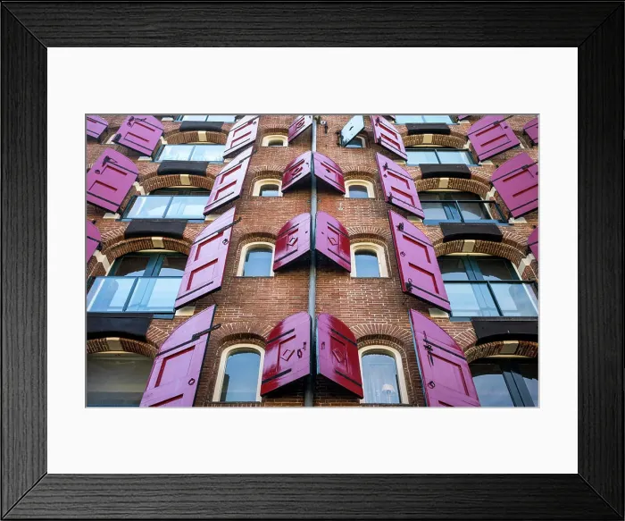 Framed Print : amsterdam, red light district, an ol port warehouse converted into a house Framed Print : amsterdam, red light district, an ol port warehouse converted into a house