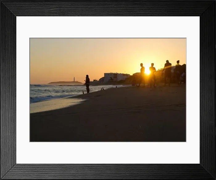 Framed Print : People on the beach at sunset, Cabo de Trafalgar in the background, Los Canos de Meca, Andalusia, Spain, Europe Framed Print : People on the beach at sunset, Cabo de Trafalgar in the background, Los Canos de Meca, Andalusia, Spain, Europe
