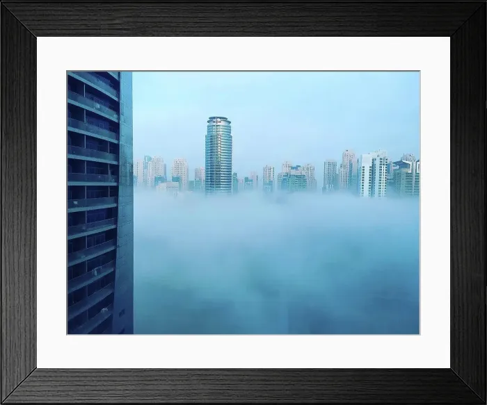 Framed Print : Modern skyscrapers of Dubai Marina in blue fog, climate change Framed Print : Modern skyscrapers of Dubai Marina in blue fog, climate change