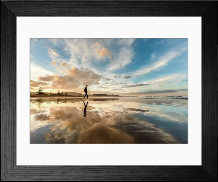 Framed Print : Teen with surfboard on a beach in New Zealand at sunset Framed Print : Teen with surfboard on a beach in New Zealand at sunset