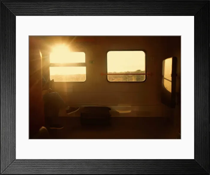 Framed Print : businessman traveling by train. passenger man in casual clothes Framed Print : businessman traveling by train. passenger man in casual clothes