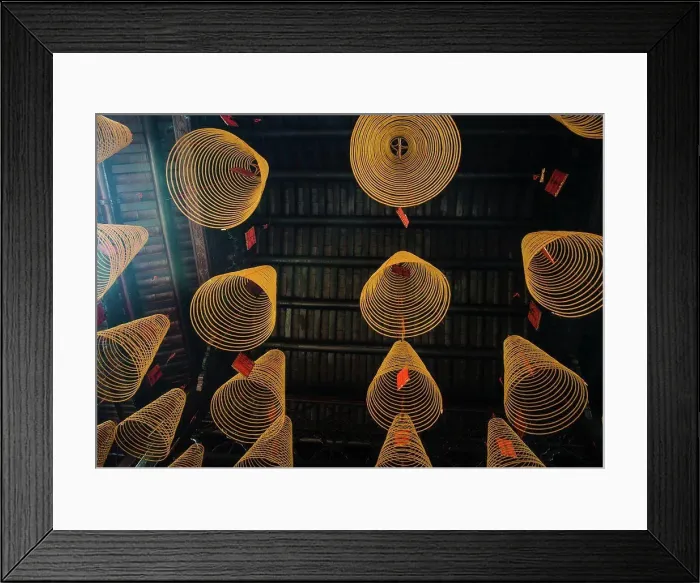 Framed Print : Coiled incense hanging from the ceiling of a buddhist temple, Vietnam, Southeast Asia Framed Print : Coiled incense hanging from the ceiling of a buddhist temple, Vietnam, Southeast Asia