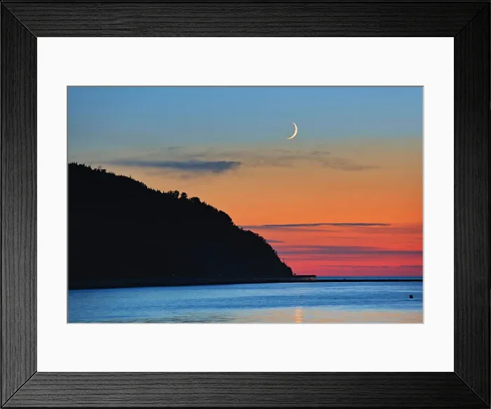 Framed Print : Shoreline along the Gulf of St. Lawrence at sunrise with crescent moon Mont-Louis Quebec Canada Framed Print : Shoreline along the Gulf of St. Lawrence at sunrise with crescent moon Mont-Louis Quebec Canada