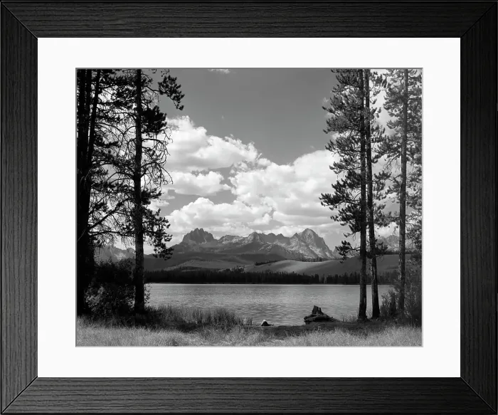 Framed Print : 1960S Little Red Fish Lake In Idaho With Saw Tooth Mountains In Background Viewed Between Clearing In Trees