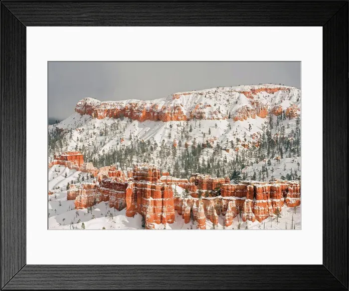 Framed Print : Snowy winter landscape of the hoodoo (pillars of rock left by erosion) structures in Bryce Canyon National Park Framed Print : Snowy winter landscape of the hoodoo (pillars of rock left by erosion) structures in Bryce Canyon National Park