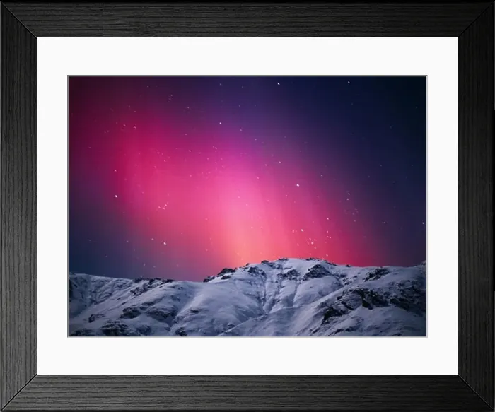 Framed Print : The Northern Light's auroral colors are produced when charged solar particles strike single atoms of oxygen Framed Print : The Northern Light's auroral colors are produced when charged solar particles strike single atoms of oxygen