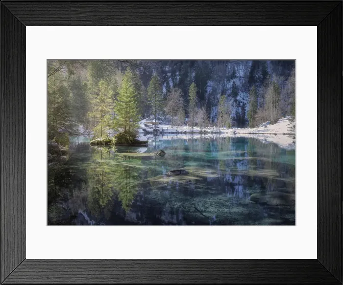 Framed Print : Landscape of peaceful azure lake with snowy shore in mountains of Switzerland Framed Print : Landscape of peaceful azure lake with snowy shore in mountains of Switzerland