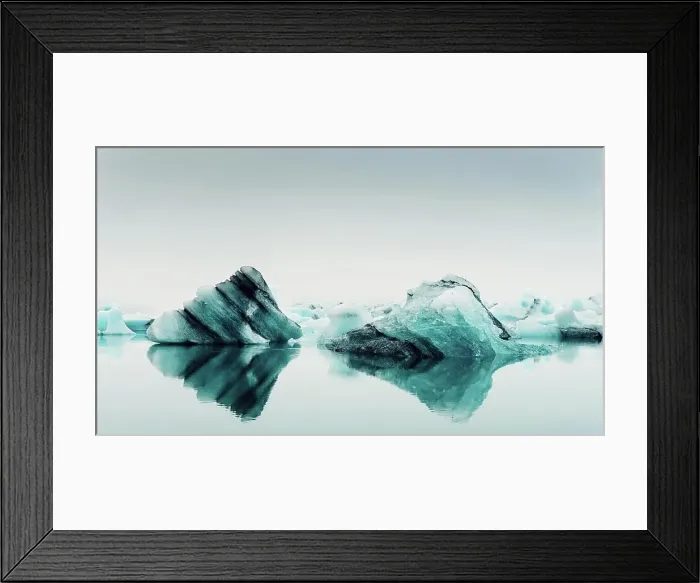 Framed Print : Picturesque view of ice on water surface between snow in winter in Iceland Framed Print : Picturesque view of ice on water surface between snow in winter in Iceland