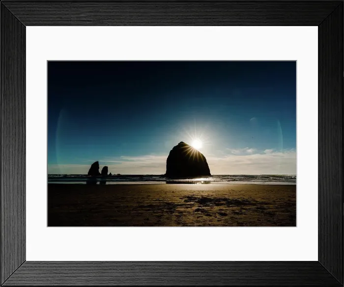 Framed Print : Moody image of haystack rock just before sunset Framed Print : Moody image of haystack rock just before sunset