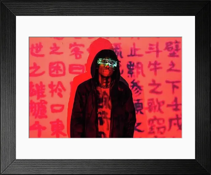 Framed Print : Studio portrait with red neon lights of a futuristic man with AR goggles in a wall with chinese words Framed Print : Studio portrait with red neon lights of a futuristic man with AR goggles in a wall with chinese words