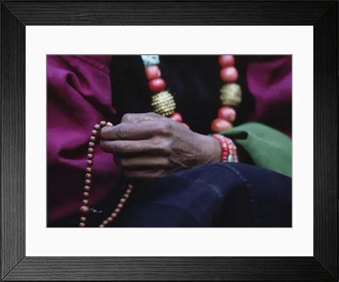 Framed Print : DOLPO WOMAN counts beads on her BUDDHIST ROSARY and wears a CORAL, TURQUOISE and GOLD NECKLACE - DOLPO DISTRICT, NEPAL Framed Print : DOLPO WOMAN counts beads on her BUDDHIST ROSARY and wears a CORAL, TURQUOISE and GOLD NECKLACE - DOLPO DISTRICT, NEPAL