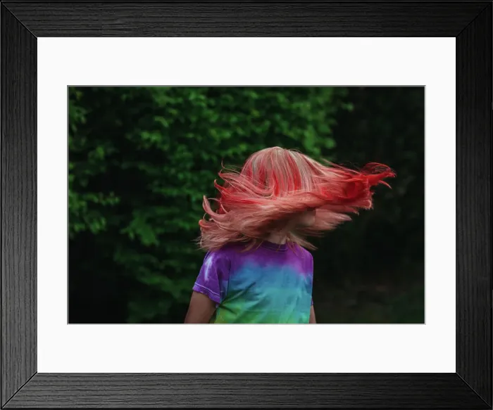 Framed Print : Young girl shaking hair outside with dyed red hair Framed Print : Young girl shaking hair outside with dyed red hair
