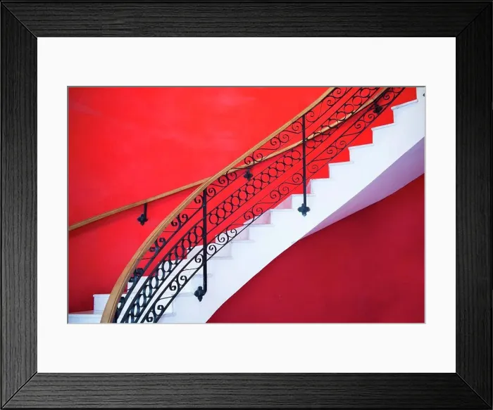Framed Print : White sweeping staircase set against a red wall in Havana Framed Print : White sweeping staircase set against a red wall in Havana