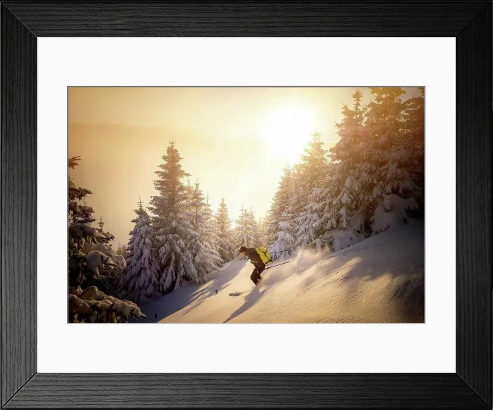Framed Print : Mid adult man skiing on snowy mountain during sunrise Framed Print : Mid adult man skiing on snowy mountain during sunrise