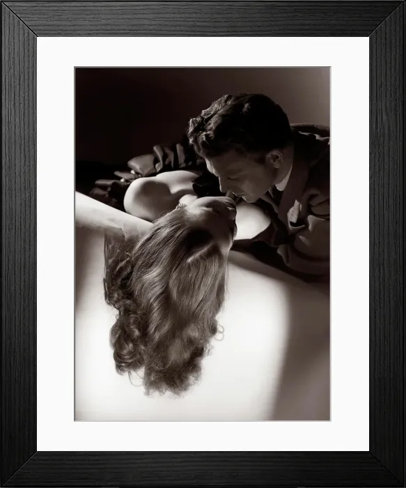 Framed Print : Romantic Couple Embracing About To Kiss On Sofa Husband Silhouette Wife Long Blond Hair Studio 1940S 1950S Framed Print : Romantic Couple Embracing About To Kiss On Sofa Husband Silhouette Wife Long Blond Hair Studio 1940S 1950S