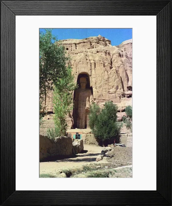 Framed Print : The Buddhas of Bamiyan were two 6th century monumental statues of standing buddhas carved into the side of a cliff Framed Print : The Buddhas of Bamiyan were two 6th century monumental statues of standing buddhas carved into the side of a cliff
