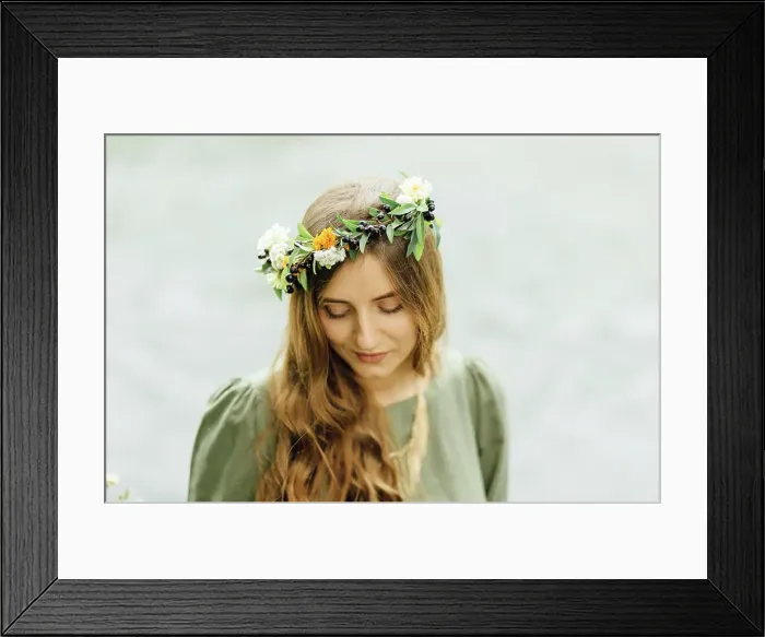 Framed Print : Middle Eastern woman wearing flower crown looking down Framed Print : Middle Eastern woman wearing flower crown looking down