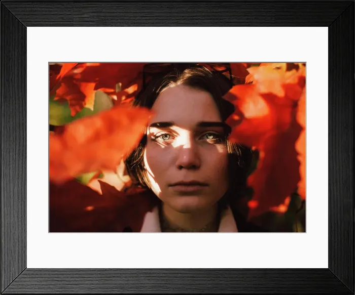 Framed Print : Portrait of teenage girl standing among red leaves during autumn Framed Print : Portrait of teenage girl standing among red leaves during autumn