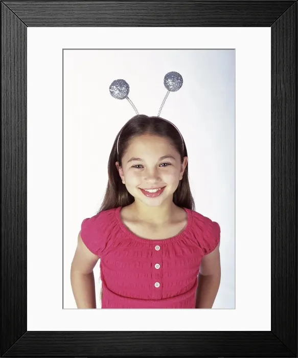 Framed Print : Portrait of a girl wearing antennas on her head Framed Print : Portrait of a girl wearing antennas on her head