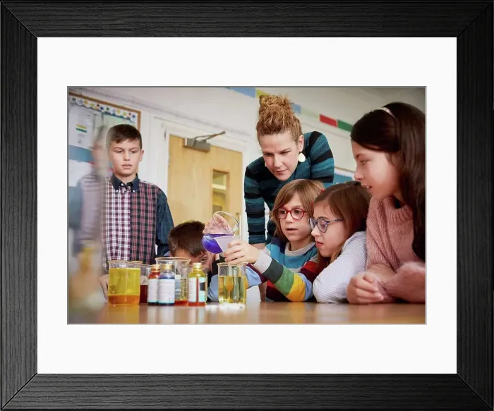 Framed Print : Children in a science lesson with a teacher Framed Print : Children in a science lesson with a teacher