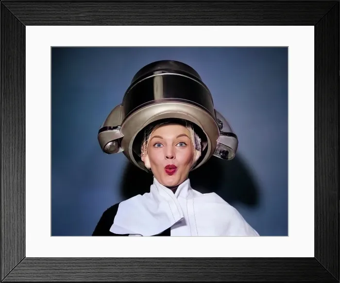 Framed Print : 1950s SURPRISED WOMAN SITTING UNDER HAIR DRYER WITH TOWEL ON SHOULDERS AND HAIR NET LOOKING AT CAMERA Framed Print : 1950s SURPRISED WOMAN SITTING UNDER HAIR DRYER WITH TOWEL ON SHOULDERS AND HAIR NET LOOKING AT CAMERA