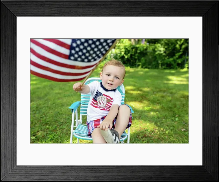 Framed Print : Toddler boy holding American flag wearing Patriotic shirt Framed Print : Toddler boy holding American flag wearing Patriotic shirt