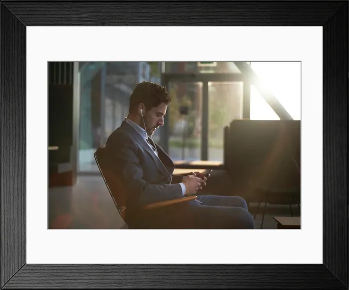 Framed Print : Man wearing a suit waiting for his job interview