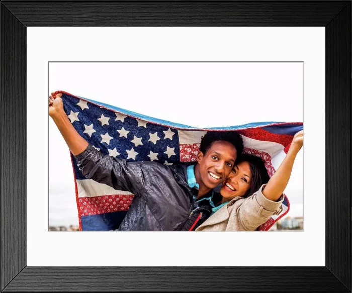 Framed Print : Couple holding American flag quilt outdoors Framed Print : Couple holding American flag quilt outdoors