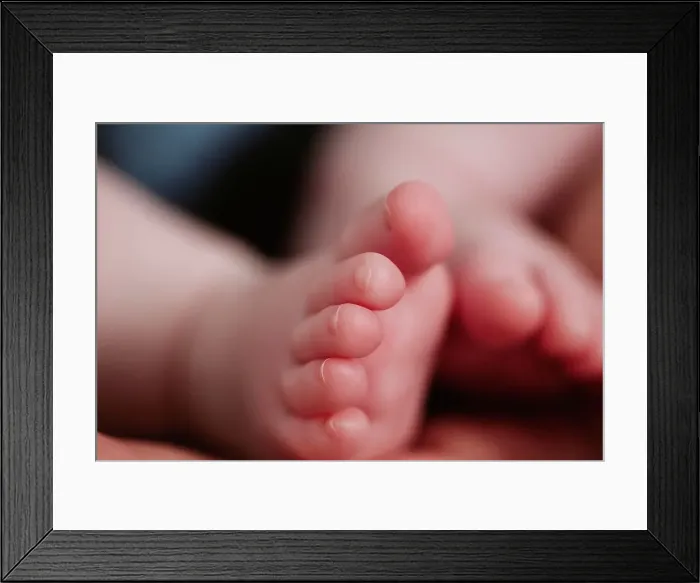 Framed Print : Extreme close-up of baby girl's feet Framed Print : Extreme close-up of baby girl's feet