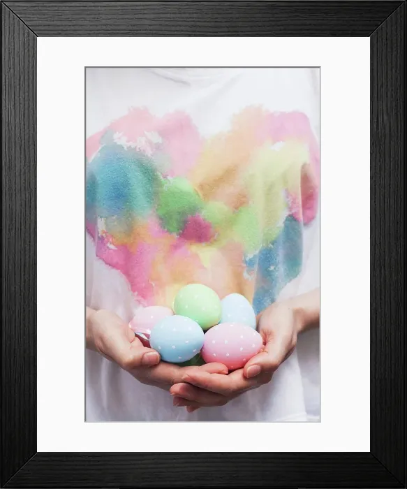 Framed Print : Woman holding Easter eggs Framed Print : Woman holding Easter eggs