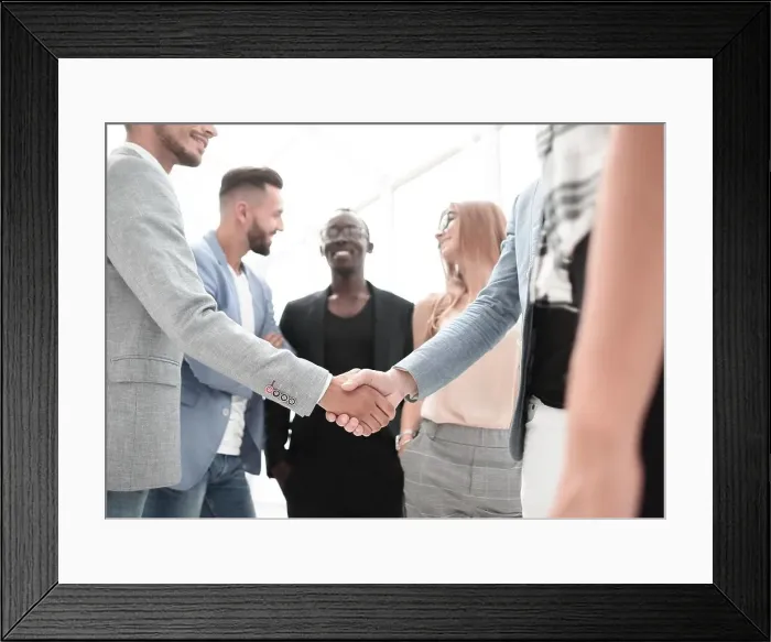 Framed Print : Smiling business people team working in the office Framed Print : Smiling business people team working in the office