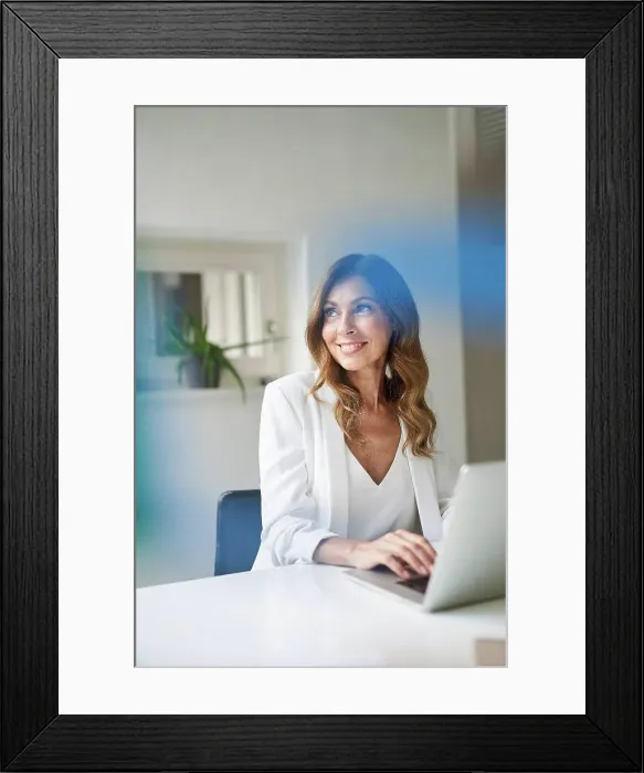 Framed Print : Business woman using laptop Framed Print : Business woman using laptop
