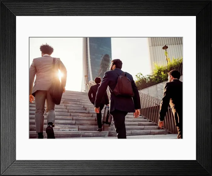 Framed Print : Mixed race group of businessmen hanging out together in town Framed Print : Mixed race group of businessmen hanging out together in town
