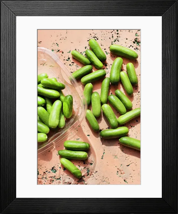 Framed Print : Overhead view of cucumbers on concrete surface Framed Print : Overhead view of cucumbers on concrete surface