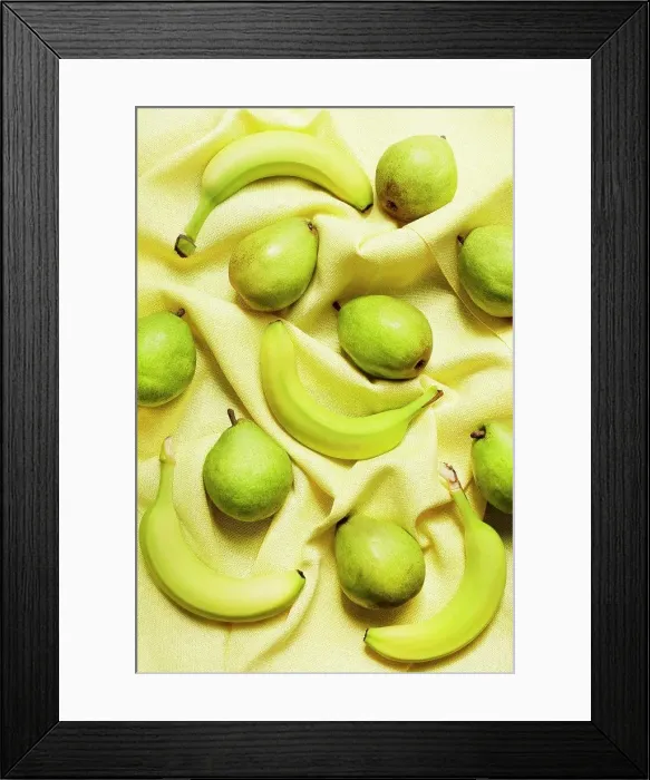 Framed Print : Overhead view of bananas and pears on yellow table cloth Framed Print : Overhead view of bananas and pears on yellow table cloth
