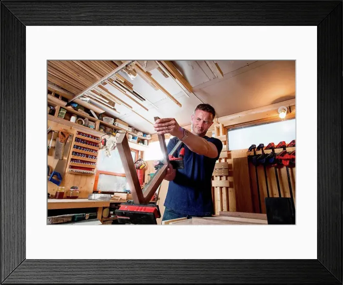 Framed Print : Craftsman preparing parts for wooden object Framed Print : Craftsman preparing parts for wooden object
