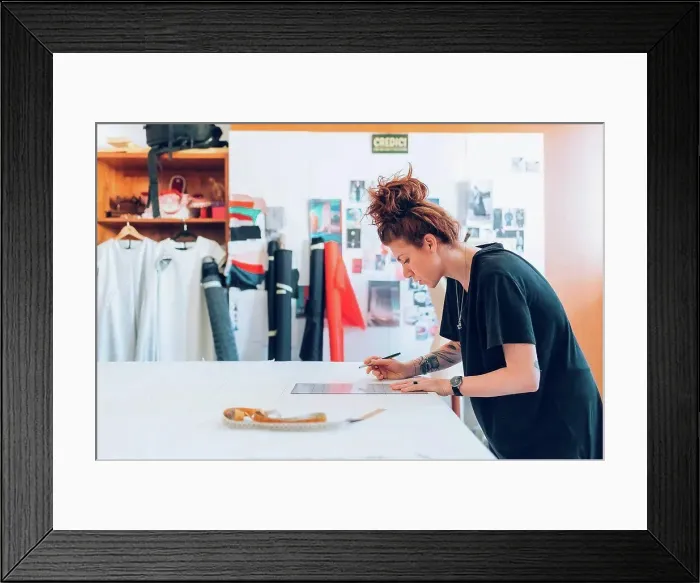 Framed Print : Fashion designer drawing and creating dressmaker's pattern Framed Print : Fashion designer drawing and creating dressmaker's pattern