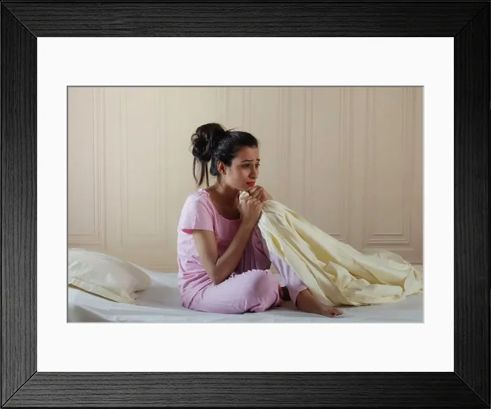 Framed Print : Young girl sitting alone in distress Framed Print : Young girl sitting alone in distress