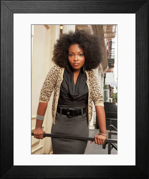 Framed Print : Businesswoman leaning over banister Framed Print : Businesswoman leaning over banister