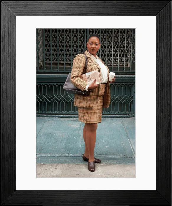 Framed Print : Black businesswoman smiling on city sidewalk Framed Print : Black businesswoman smiling on city sidewalk