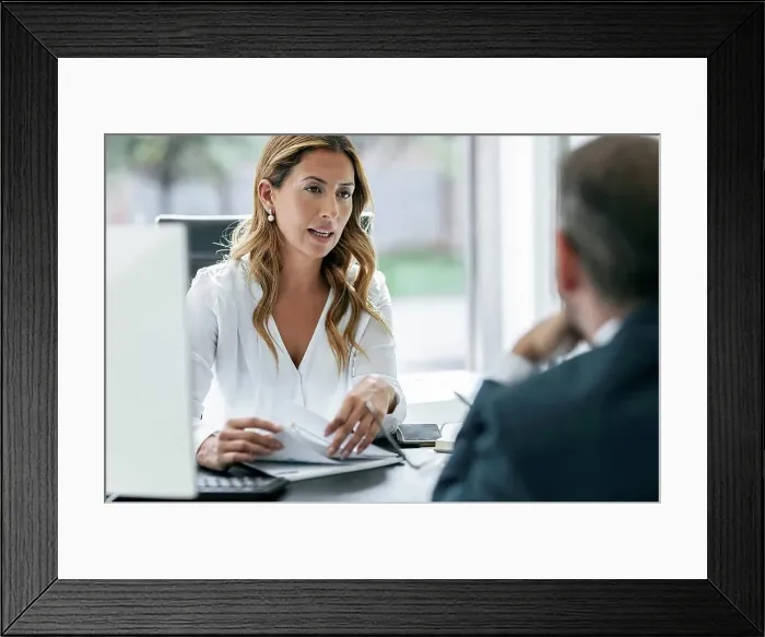 Framed Print : Business colleagues discussing in office Framed Print : Business colleagues discussing in office