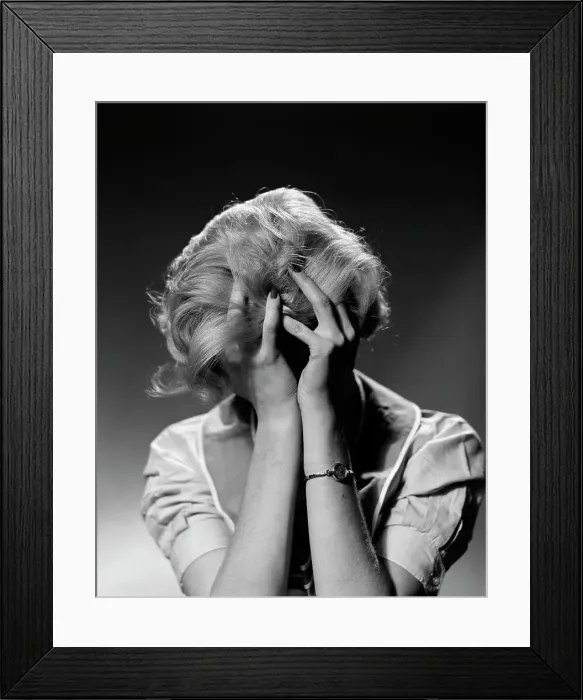 Framed Print : 1950S Blond Woman With Headache Holding Head In Hands Framed Print : 1950S Blond Woman With Headache Holding Head In Hands